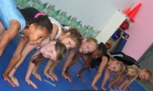 Kids in gymnastics class