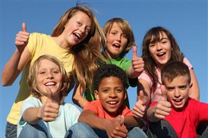 children posing with thumbs up